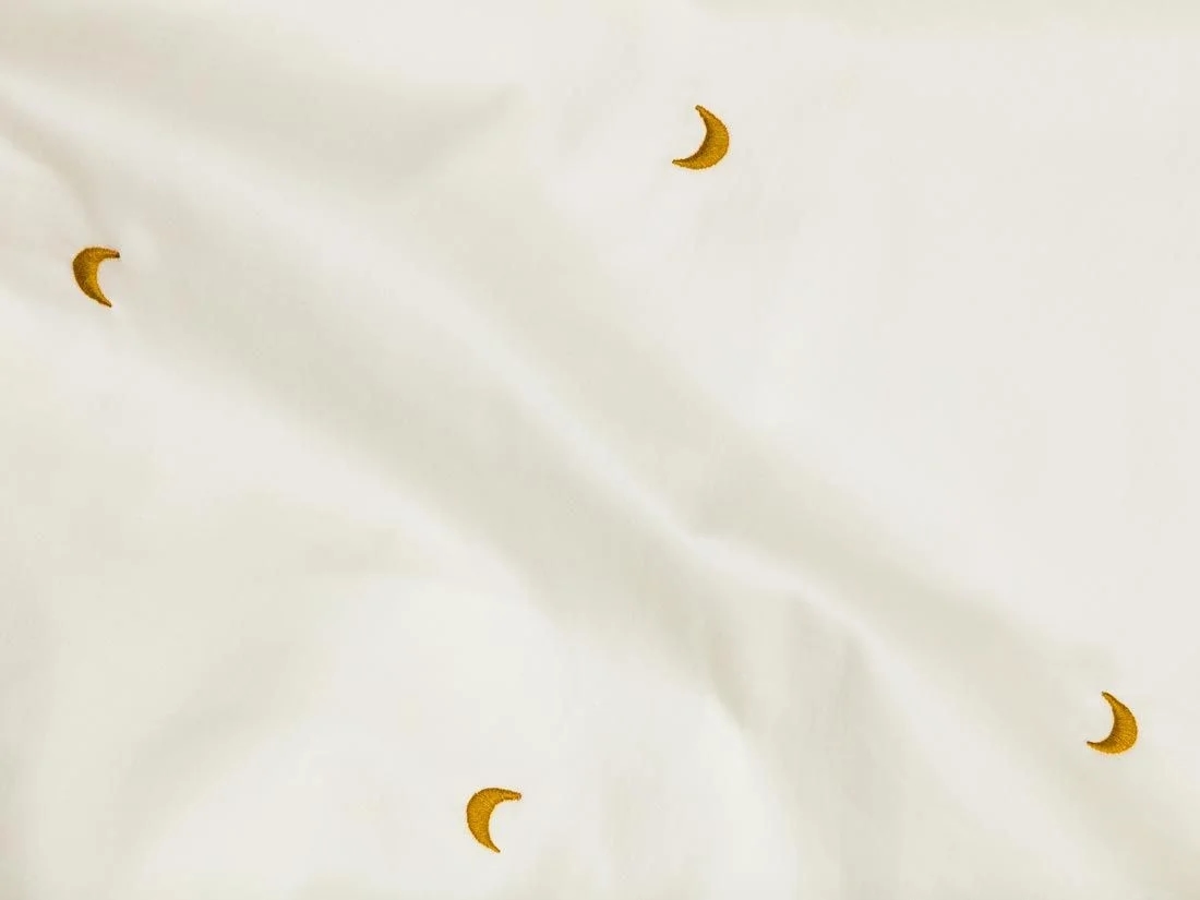 Kinderlaken katoen satijn warm white/ochre moon